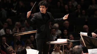 Euan Shields, the 2023 winner of the Siemens Hallé International Conductors Competition, conducting the Hallé